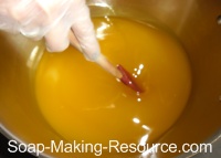 Mixing Essential Oil Blend into Honey Soap Recipe