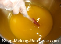 Mixing Essential Oil Blend into Honey Soap Recipe Mixing Essential Oil Blend into Honey Soap Recipe