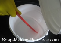 Pouring Dry Lye into Distilled Water