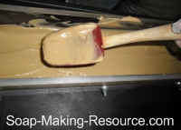 Pouring First Coffee Soap Layer into Mold Pouring First Coffee Soap Layer into Mold