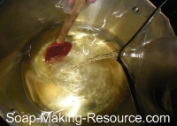 Pouring Lye into Oils