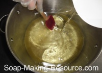 Pouring Lye into Oils Pouring Lye into Oils