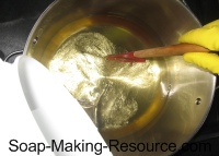 Pouring Lye into Oils Pouring Lye into Oils
