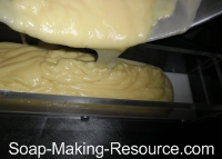 Pouring Soap into Mold Pouring Soap into Mold