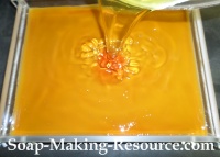 Pouring the Mango Butter Lotion Bar Batch into our Acrylic Mold