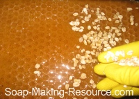 Sprinkling Oats onto Top of Soap