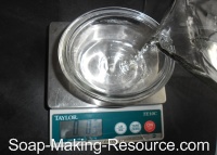 Weighing Out Distilled Water for Diluting the Honey Weighing Out Distilled Water for Diluting the Honey