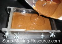 Pouring Soap into Soap Mold