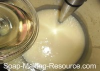 Pouring Essential Oils into Soap Pouring Essential Oils into Soap
