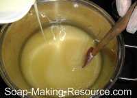 Pouring Goat's Milk Lye Solution into Oils