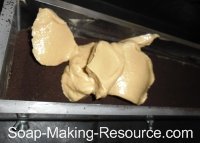 Pouring Second Coffee Soap Layer into Mold