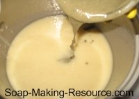 Pouring Small Bentonite Clay Soap Portion Into Rest of Batch