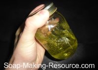 Shaking Homemade Bug Repellent Batch