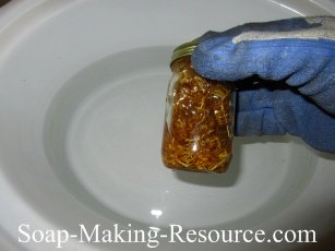 Shaking the Calendula Petals and Olive Oil Mixture