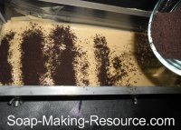 Sprinkling Layer of Coffee Grounds